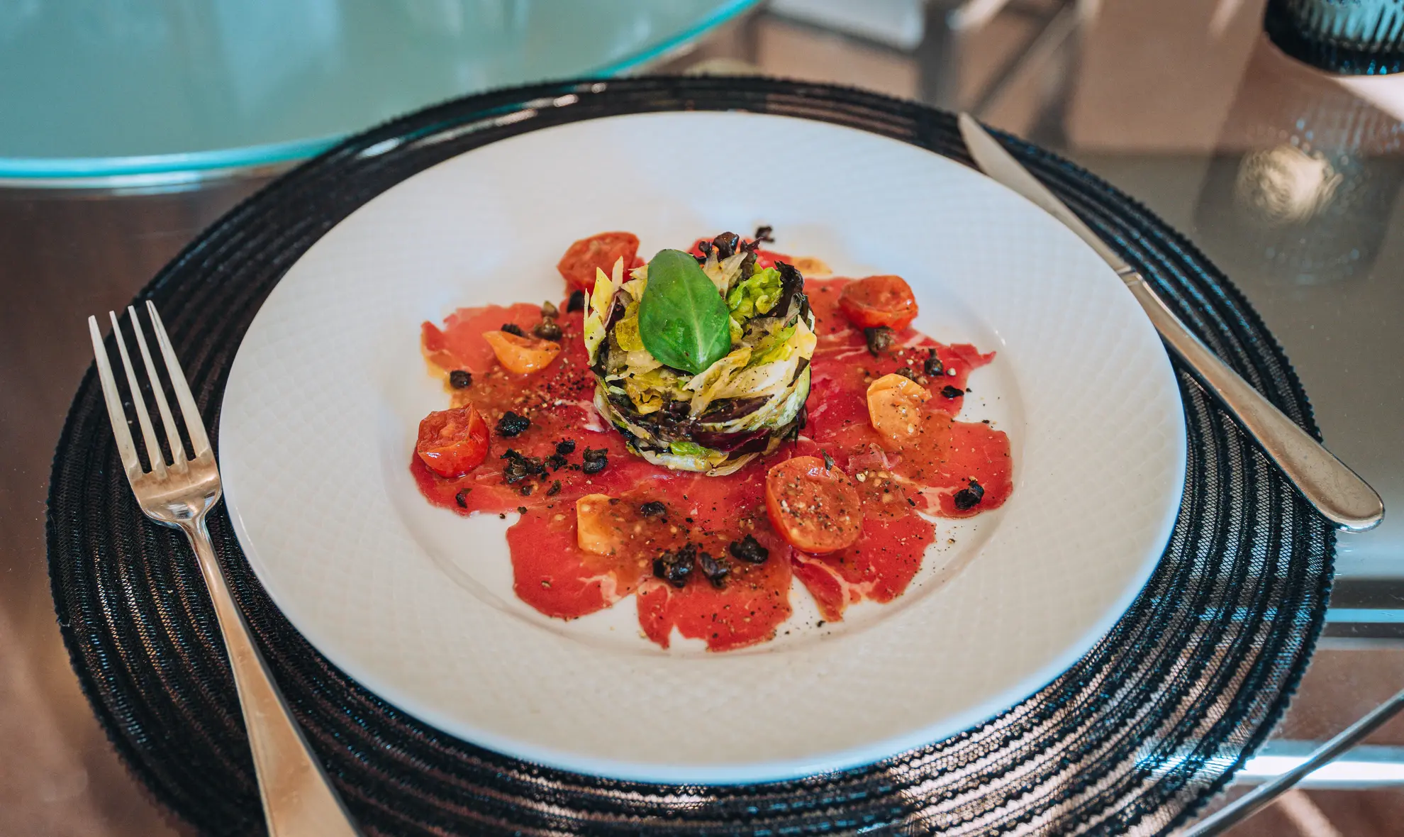 Tomato carpaccio and summer greens