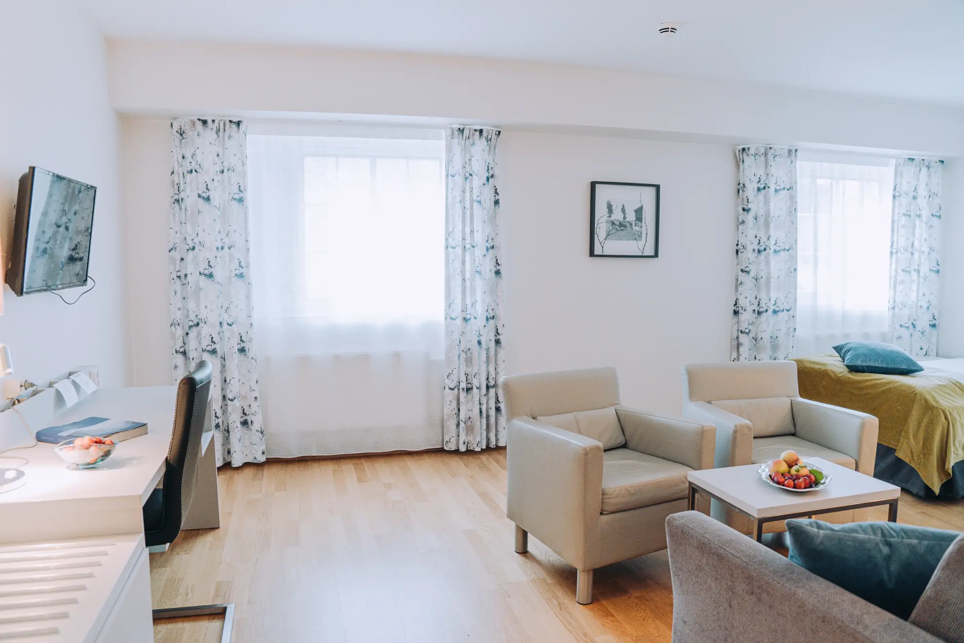 A bright suite with seating area